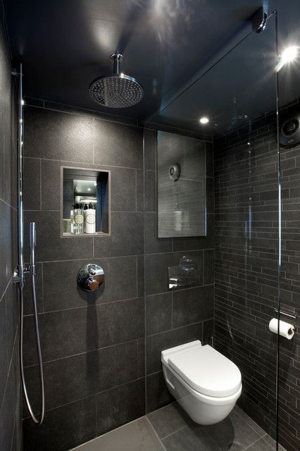 Decoración de baño en tonos oscuros